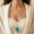 Sculptural Turquoise Resin Elephant Pendant Necklace | Iridescent Aquamarine Glass Beaded Jewelry | Artisanal Nature-Inspired Statement Accessory