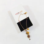 Manasvi Dragonfly Charm & Pink Resin Floral Pendant necklace