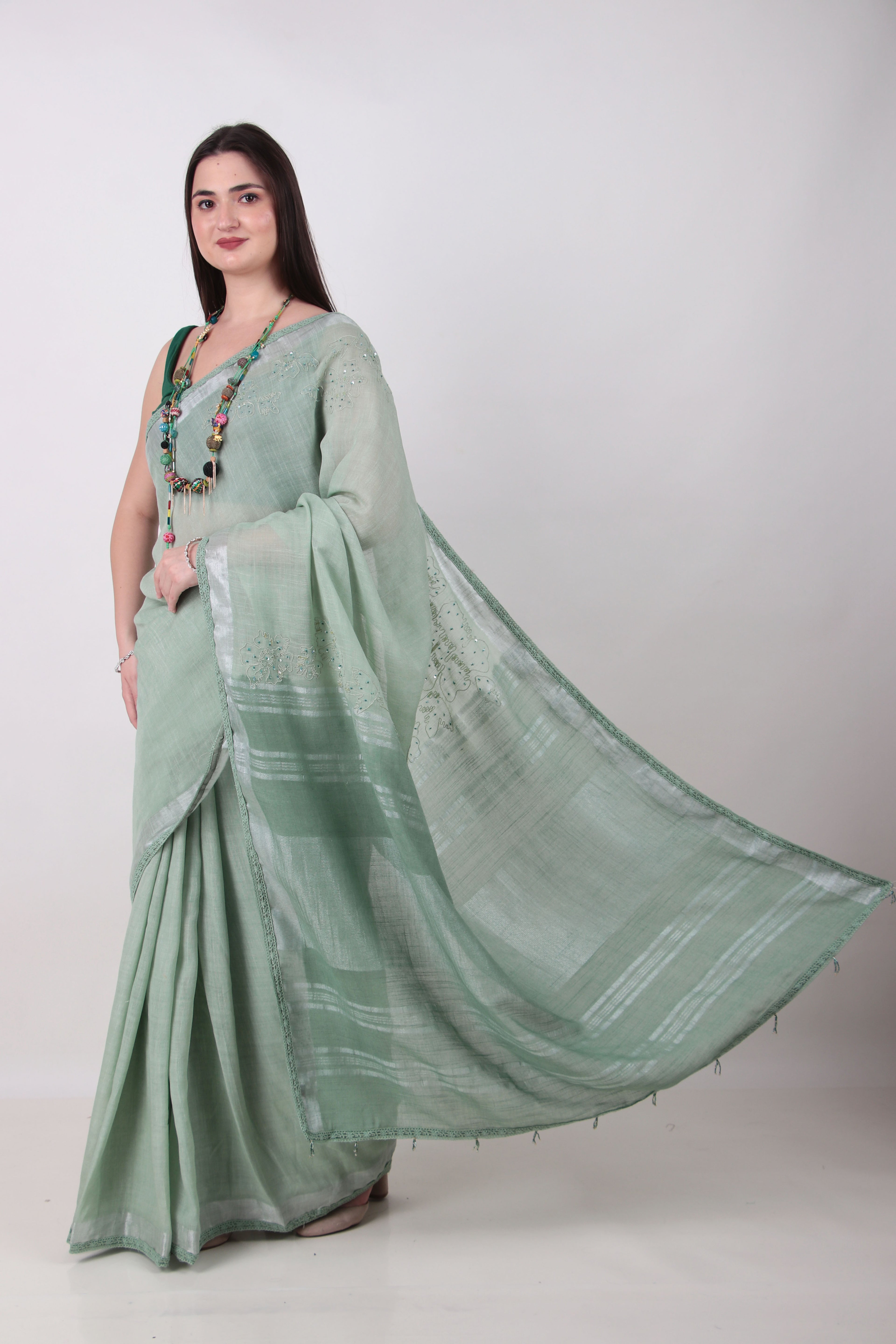 VRISHNI –sage green saree