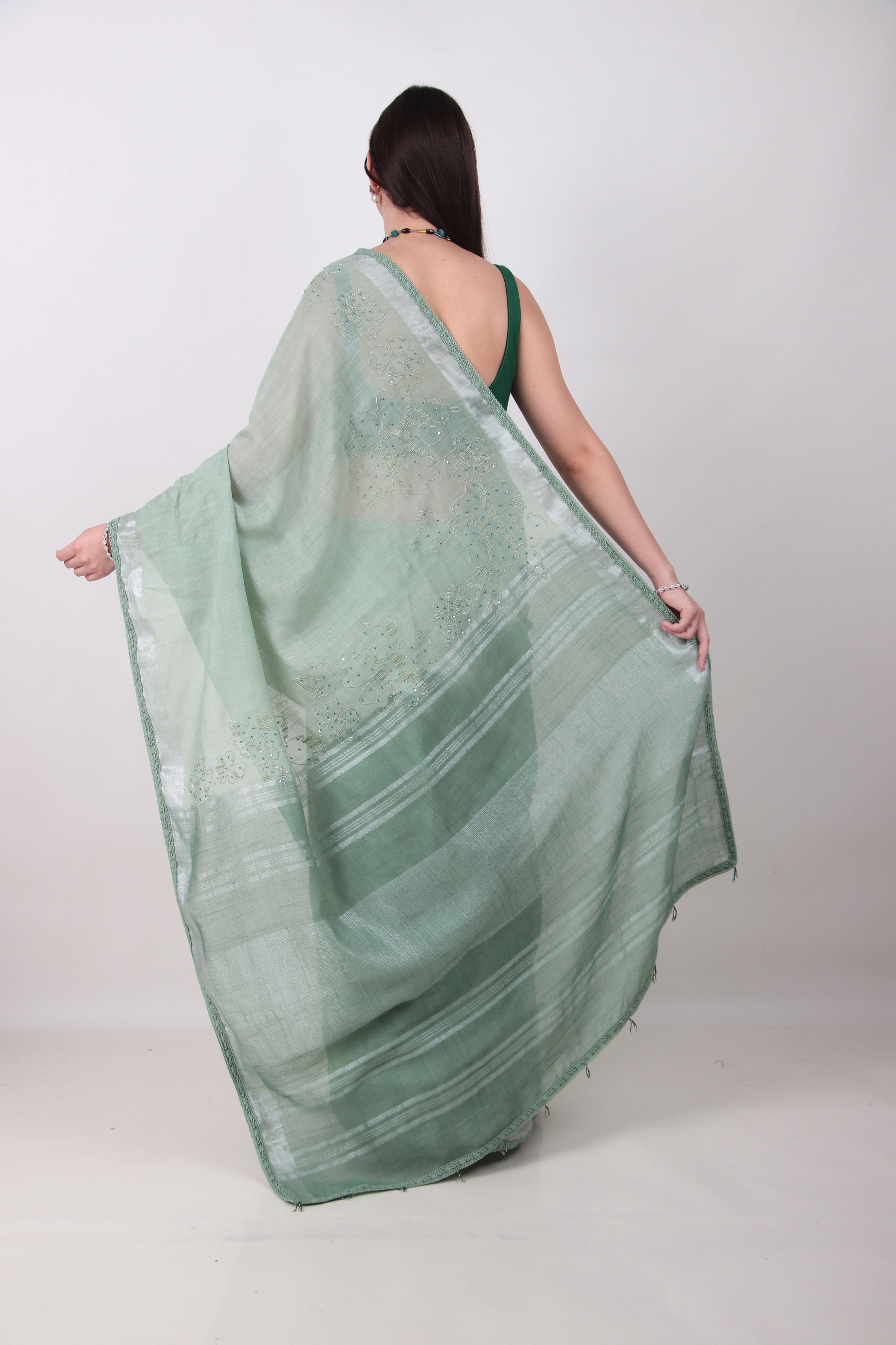 VRISHNI –sage green saree